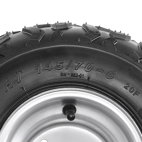 Close-up of Set Of 4 ATV Go Kart Tires 145/70-6 with 6 inch wheels, showing detailed tread and metal rim design.
