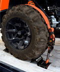 Wheel Chock Tie Down Kit With Rubber Grip Sleeve for Trailer E Track System securing an ATV tire, 1500lb load, close-up.