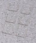 Car Bumper Staples Kit For Auto Body Repair 500Pcs Pre Cut Wave Staples For Hot Stapler Welding shown on a gray surface
