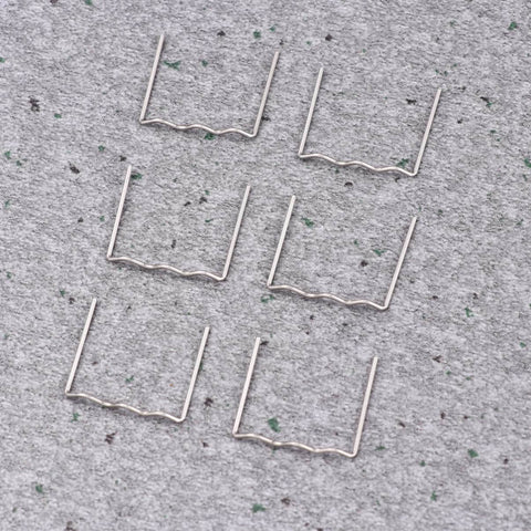 Car Bumper Staples Kit For Auto Body Repair 500Pcs Pre Cut Wave Staples For Hot Stapler Welding shown on a gray surface