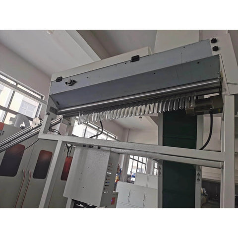 Side view of High Speed Automatic PET Bottle Blowing Machine With Adjustable Molds for beverage factory in large-scale manufacturing.