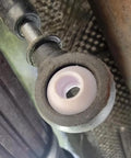 Installed view of Automatic Transmission Shift Cable Bushing Repair Kit for loose shifting fix in vehicle's gear selector linkage.