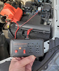 Automotive Relay Tester With Puller For 12V Cars And Trucks, held above car engine, shows LED status alerts and pin detection