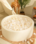 Ball Pit Balls 100 PCS, Star Shapes for Babies Kids Playpen Plastic Balls in beige white clear colors in a beige baby ball pit
