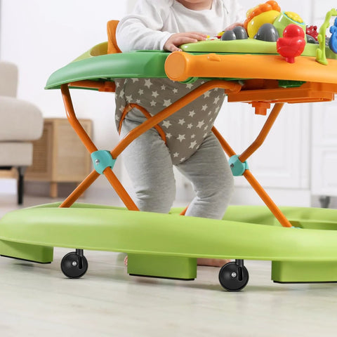 4 Pcs Baby Walker Replacement Wheels Set Quiet Wear Resistant Plastic Casters For Baby Walkers And Strollers Easy To Install Universal Compatibility With Most Models Ideal For Indoor And Outdoor Use Noise Free Operation And Durable Construction installed on a green baby walker with a baby playing