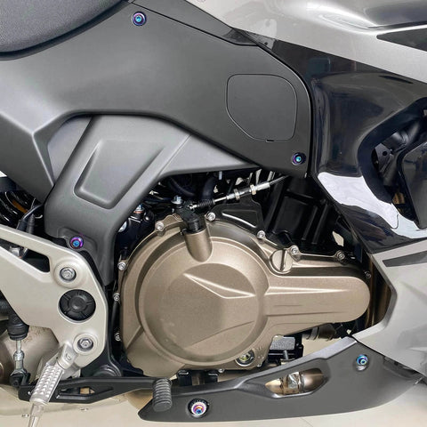 Side view of a motorcycle engine with ✝️ BAIONE Fairing Bolt Kit 195PCS Stainless Steel M5 M6 screws installed on a sportbike