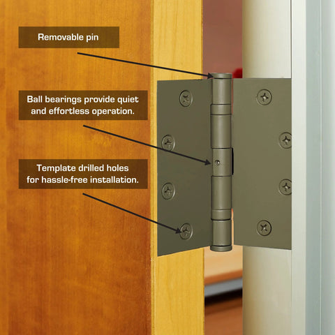 4 Pack Four And One Half Inch Ball Bearing Door Hinges With Prime Coat on a wood door, showing removable pin and drilled holes