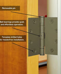 Close-up of 4 Pack 4.5 Inch Ball Bearing Door Hinges Prime Coated attached to a wooden door with labeled features.