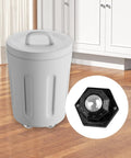 Photo of Four Ball Bearing Rollers With 360 Degree Swivel Universal Ball Casters installed on a trash can, in a kitchen setting.