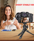 Side view of Professional Ball Head Mount With 360 Degree Rotation supporting a DSLR camera, capturing a woman enjoying coffee.