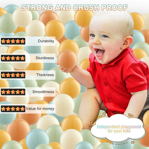 Baby in a red shirt sitting with Ball Pit Balls (100 Pack, Orange,Teal) Plastic Balls for Various Games, Ideal for Ball Pits and Playhouses.