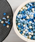 Ball Pit Balls Stars Moon Shapes Plastic Pitballs for Toddler Play Tent Baby Photo Props Kids Pool Water Toys Kiddie Pool Party Decor, Pearl Blue+Cream Blue+White,100PCS displayed in a play area.