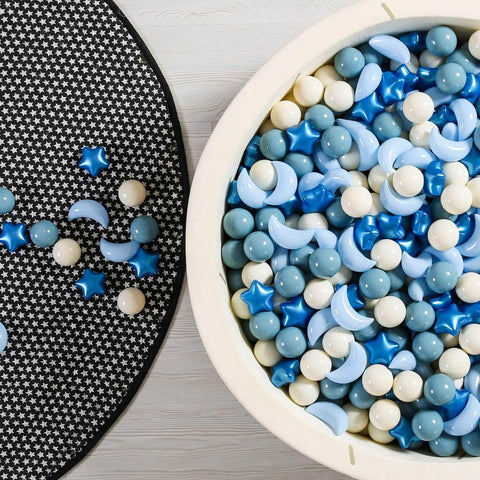 Ball Pit Balls Stars Moon Shapes Plastic Pitballs for Toddler Play Tent Baby Photo Props Kids Pool Water Toys Kiddie Pool Party Decor, Pearl Blue+Cream Blue+White,100PCS displayed in a play area.