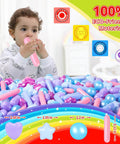 Toddler playing with colorful 200-pack crush proof plastic children's toy balls in mermaid ocean colors with 4 shapes for indoor outdoor use.