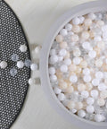 Ball Pit Balls Plastic Playballs for Baby Toddlers Kids Boys Girls Playhouse Decor Play Pool Fun Phthalate-Free BPA-Free Bath Toy White Beige Transparent,100 Balls in a gray container.