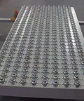 Sixteen Piece Five Eighth Inch Ball Transfer Bearings Set Flange Mounted Carbon Steel Heavy Duty 360 Degree Rotation Units on table