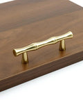 Gold brass retro antique finish bamboo-shaped cabinet handle on wood surface. Aluminum Alloy Bamboo Shape Cabinet Handles 2 Pack Drawer Pulls 3.7 Inch Length 2.5 Inch Center To Center Hole Distance For Cabinets Closets Dressers.