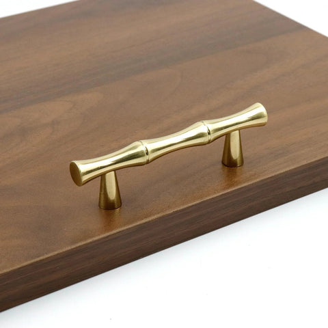 Gold brass retro antique finish bamboo-shaped cabinet handle on wood surface. Aluminum Alloy Bamboo Shape Cabinet Handles 2 Pack Drawer Pulls 3.7 Inch Length 2.5 Inch Center To Center Hole Distance For Cabinets Closets Dressers.