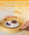 Hand holding a 12 inch bamboo lazy susan organizer with handles, showcasing its ergonomic design and portable use.