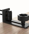 Sliding barn door floor guide with adjustable bottom rollers, flush low profile design, solid steel & POM nylon, frosted black finish.