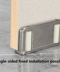 Four Barn Door Floor Guide Bearings With Adjustable Bottom Rollers In Durable Steel Frame, installed on door.