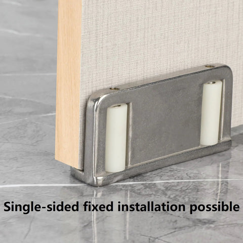 Four Barn Door Floor Guide Bearings With Adjustable Bottom Rollers In Durable Steel Frame, installed on door.