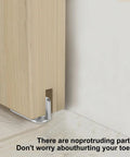 Four Barn Door Floor Guide Bearings With Adjustable Bottom Rollers installed on wooden barn door with steel frame for silent smooth operation
