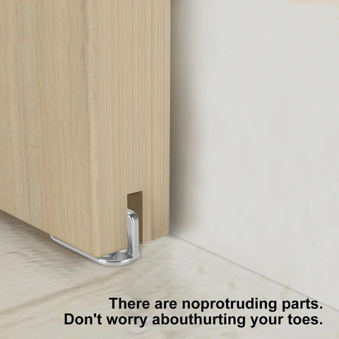 Four Barn Door Floor Guide Bearings With Adjustable Bottom Rollers installed on wooden barn door with steel frame for silent smooth operation