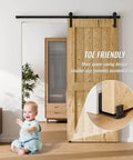 Sliding Barn Door Bottom Floor Guide with Adjustable Roller, Wall Mount Floor Guide shown installed with wood door in living room.