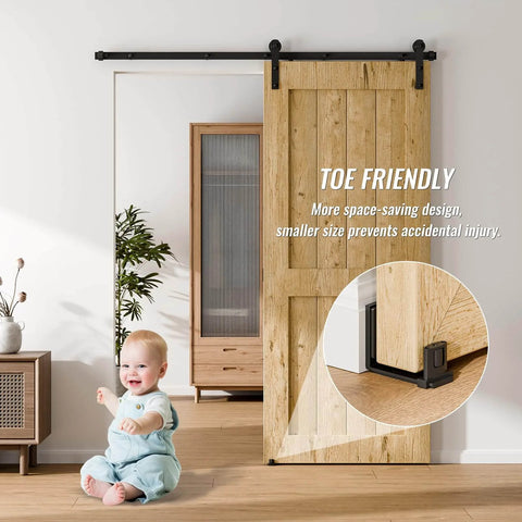 Sliding Barn Door Bottom Floor Guide with Adjustable Roller, Wall Mount Floor Guide shown installed with wood door in living room.