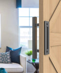 12 Inch Sliding Barn Door Handle Pull And Flush Hardware Set In Rustic Black Finish Anti Rust Steel installed on wood barn door