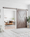 Interior view of 10 Feet Brushed Nickel Barn Door Hardware Kit-Heavy Duty Sliding Track-Smoothly and Quietly-Easy to Install-Fit 60" Wide Door Panel (J Shape Hanger) installed on wooden door.