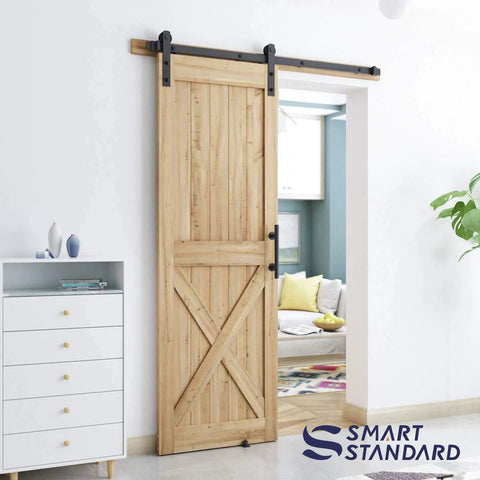 5 FT Heavy Duty Sturdy Sliding Barn Door Hardware Kit, Black on wooden door, includes handle and floor guide, fits 28-30 inch door panel.