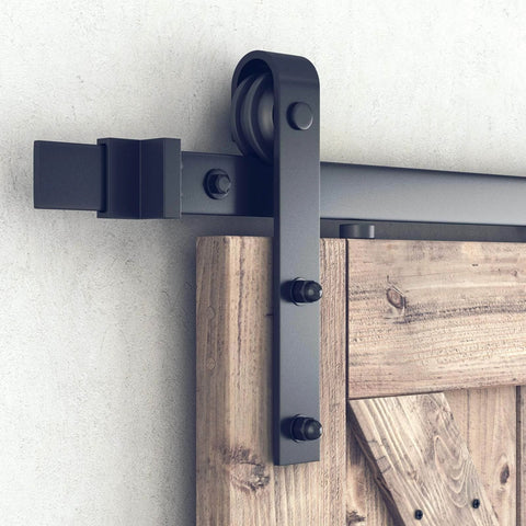 Close-up of installed 6.8FT Barn Door Hardware Kit with J Shape hanger, showcasing heavy duty alloy track and black powder coating.
