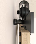 Side view close-up of 6.6FT Barn Door Hardware Kit with Heavy Duty Modular Sliding Track, J Shaped Carbon Steel System installation