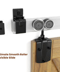 8 Foot Box Rail Sliding Barn Door Hardware Kit close-up of zinc plated railing, rollers, and brackets on wooden door
