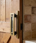 Sliding Barn Door Pulls Set Heavy Duty Flush Handle With Rustic Two Sided Design Antique Brass Finish on wooden door