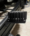Bass Shaker Mount For BST-1 Fits 100x100 Bass Vibrator With Reinforced Design installed on frame, enhancing audio performance
