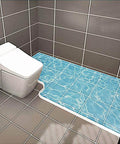 67 Inch Collapsible Shower Threshold Water Dam installed in a wheelchair-accessible bathroom with blue tile flooring.