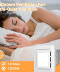 Super Quiet 120 CFM Bathroom Exhaust Fan With Light 6200K 12W LED Delivers Bright Daylight While Running At One Point Zero Sones Low Noise In A Square Ceiling Mount 4 Inch Duct Great For Shower Bathroom Laundry Room And Home Office By RLOZUI, shown in action next to a sleeping person.
