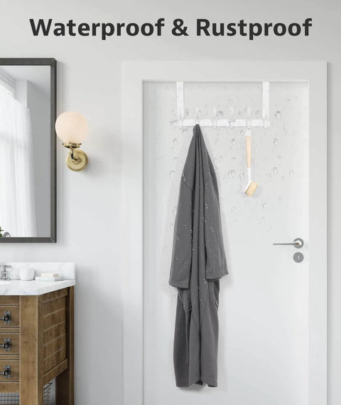 Bathroom door with waterproof and rustproof over-the-door rack holding wet towel and brush
