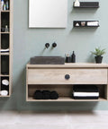 Bathroom vanity with matte black zinc skull cabinet knob, showcasing furniture hardware vintage single hole knob in use.