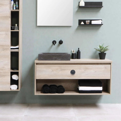 Bathroom vanity with matte black zinc skull cabinet knob, showcasing furniture hardware vintage single hole knob in use.