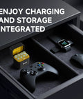 8 Slot Rechargeable Battery Charger Kit with 4 AA and 4 AAA Li Batteries next to gaming controller and smartwatch in drawer.