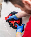 Professional using Battery Powered Tile Vacuum Suction Cup Tool for Handling Ceramic and Porcelain Tiles 220 mm Grip up to 140 kg
