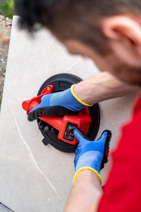 Professional using Battery Powered Tile Vacuum Suction Cup Tool for Handling Ceramic and Porcelain Tiles 220 mm Grip up to 140 kg