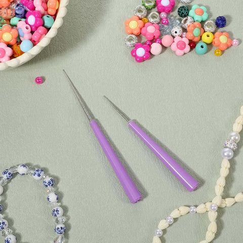 2 Piece Bead Reamer Tool Set With Diamond Tipped Reamers For Jewelry Making, Hole Enlarger for beads on a crafting mat.
