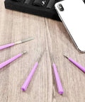 Diamond Tipped Pro Grade Bead Reamer Set For Jewelry Making And Beading Tools 10 Piece Kit with pink plastic handles on table