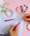 2 Pack Bead Reamer Set With Purple Handles For Jewelry Making Pro Grade enlarging bead holes on colorful bracelets.