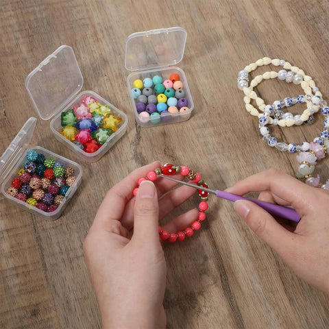 Person using 2 Piece Bead Reamer Tool Set With Diamond Tipped Reamers For Jewelry Making to enlarge bead holes on a bracelet.
